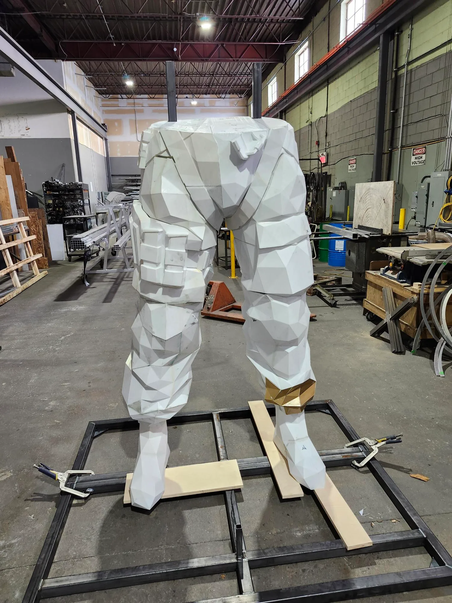 Sledge's legs assembled on their steel base in the workshop