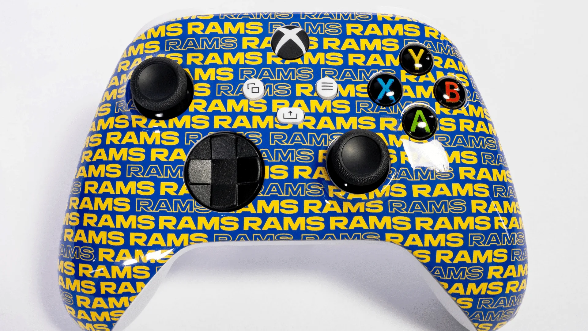 Close-up of the RAMS repeat pattern on the custom controller face